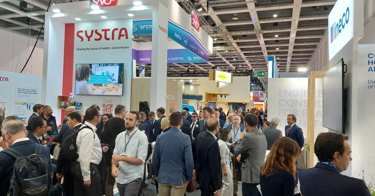 Rail industry professionals meeting and networking at InnoTrans 2026 in Berlin.